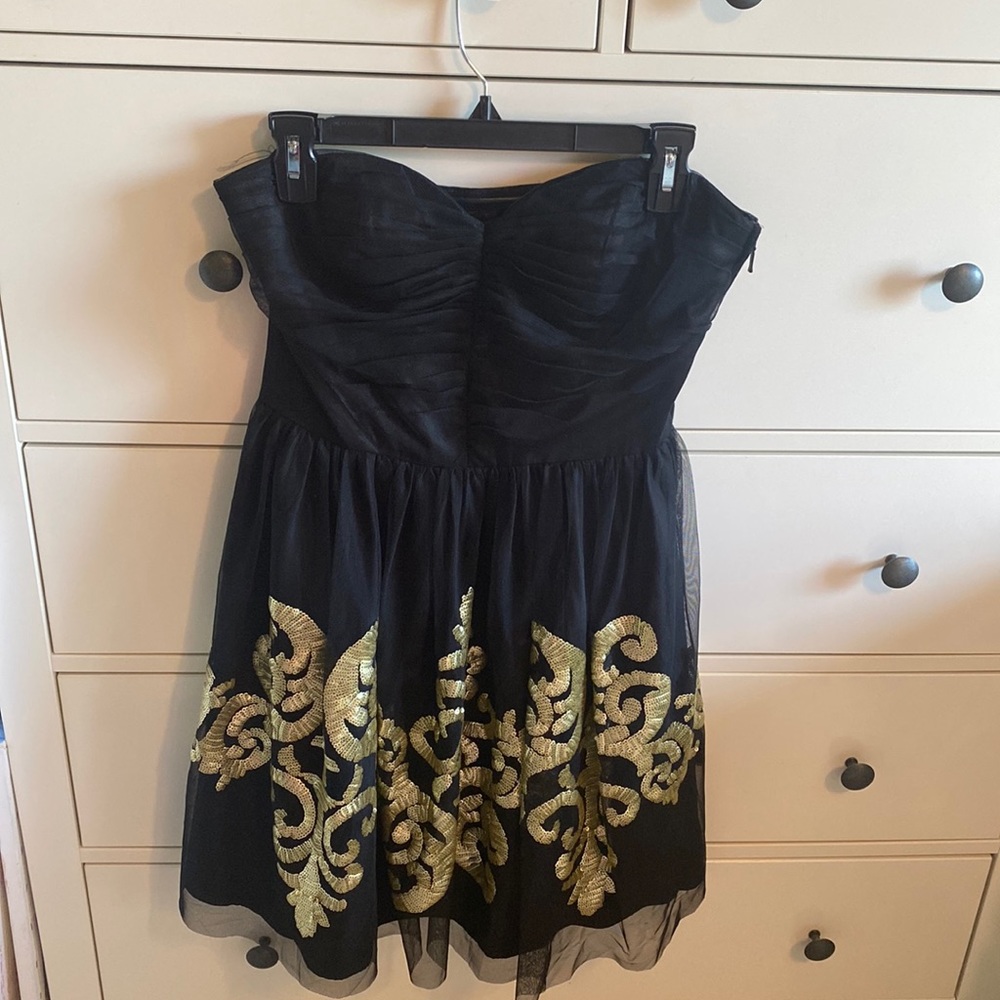 Black tulle dress with gold detailing
